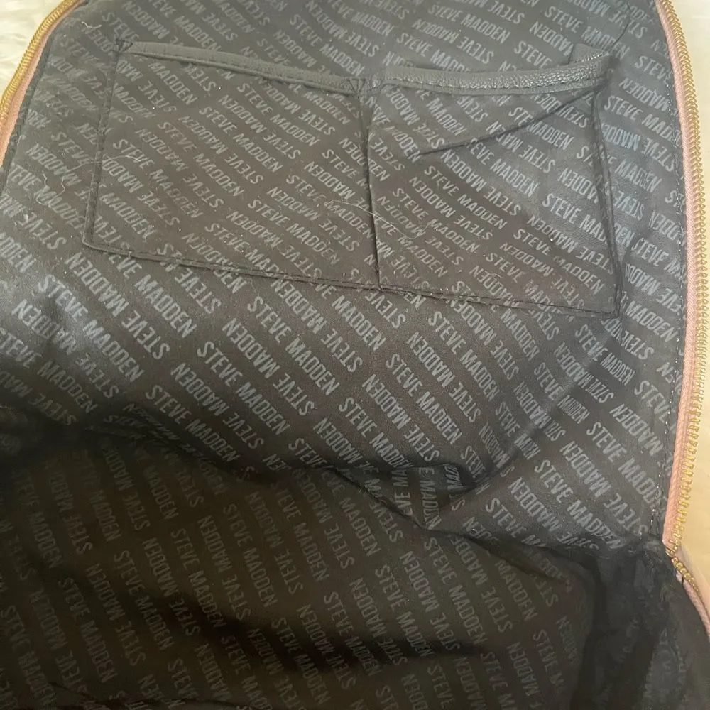 Steve Madden Nylon blush pink backpack with black embroidery back straps.